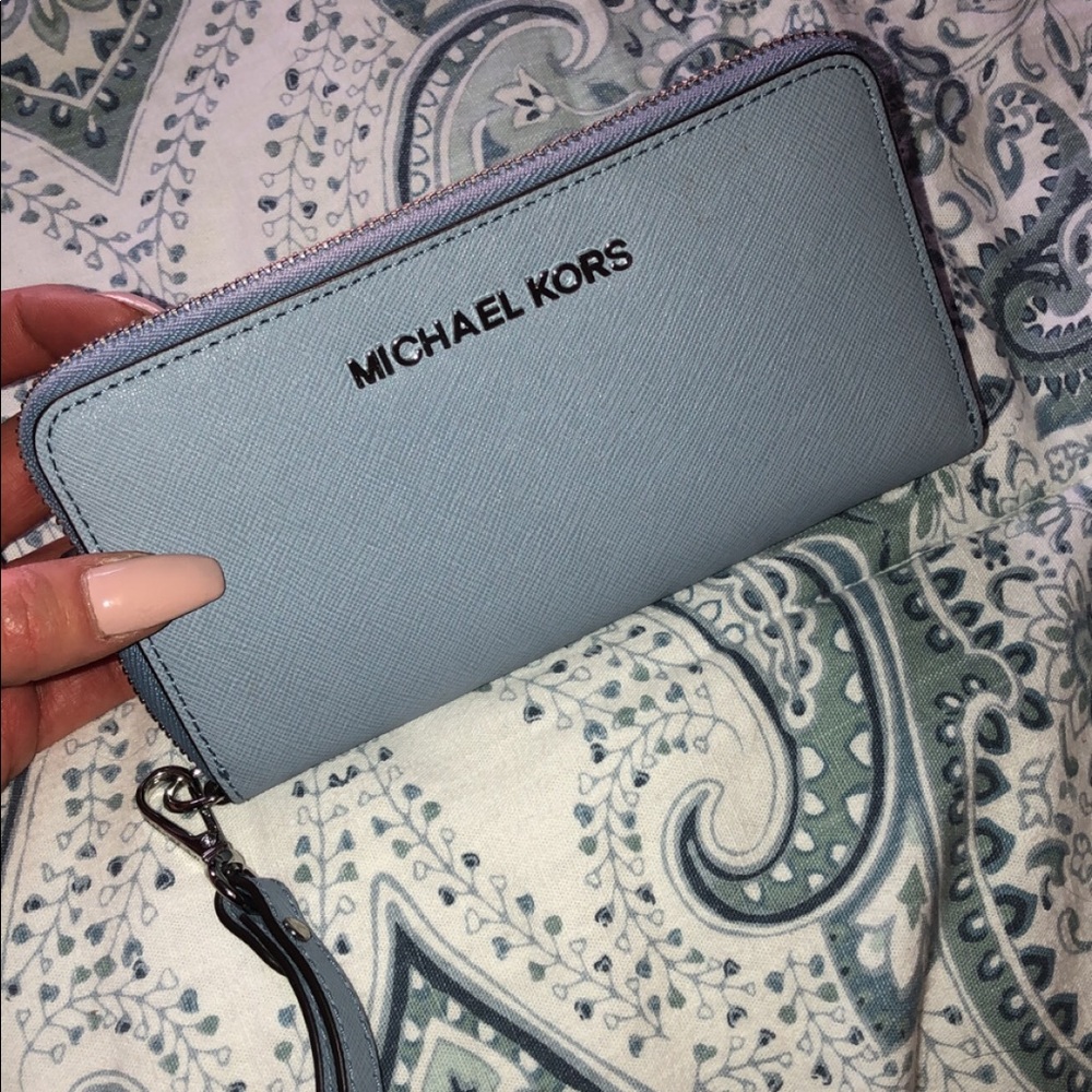 Michael kors powder blue large zip wallet.